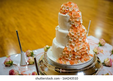 Wedding Orange Cake With Flowers And Candles