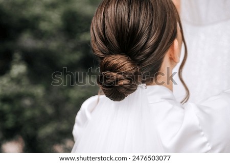 Similar – Image, Stock Photo Hair style, hairdresser, beauty and customer service concept. Cropped shot of barber man hands hold professional stylish gold hairbrush and scissors by the workplace, leather black chair in barbershop