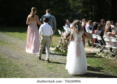 Wedding Photography: Bridesmaid, Groomsman, Flower Girl, And Ring Bearer Walking Down The Aisle Outdoor Processional