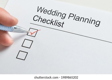 Wedding Planning Checklist. Hand Filling Check List