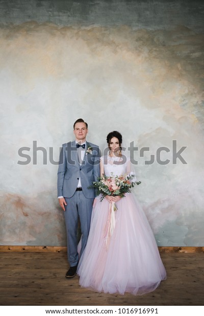 grey suit pink dress