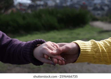 wedding proposal hands with ring