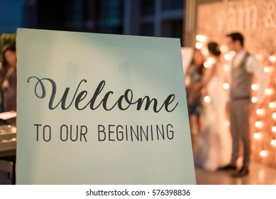 Wedding Reception. Board With Welcome Sign On It Decorated In Wedding Party