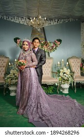 The Wedding Reception Was Held In Pangkal Lalang Village, Belitung Regency During The Corona Covid 19 Pandemic. The Bride And Groom Look Happy At The Reception Which Was Held On December 27, 2020.