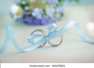 Wedding Ring With Blue Ribbon