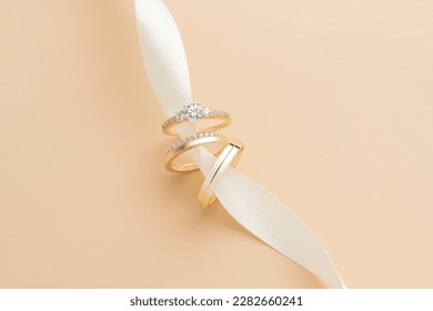 Wedding ring photography is an important part of a wedding photoshoot, capturing the elegance and significance of a couple's love and commitment. These close-up shots highlight the intricate details o - Powered by Shutterstock