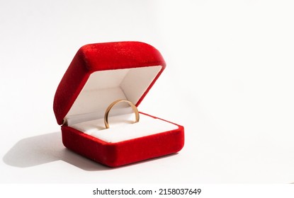 wedding ring in a red box - Powered by Shutterstock