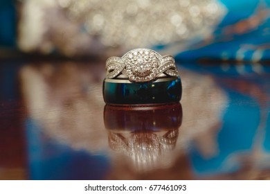 Wedding ring in a reflection.