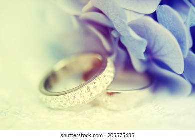 Wedding Rings With Blue Flowers.