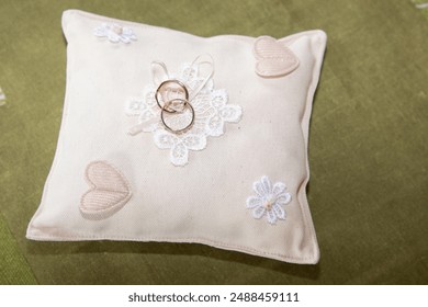 Wedding rings bride groom on the pillow - Powered by Shutterstock