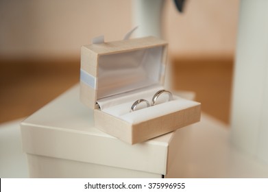 wedding rings in the ivory box on the big box - Shutterstock ID 375996955