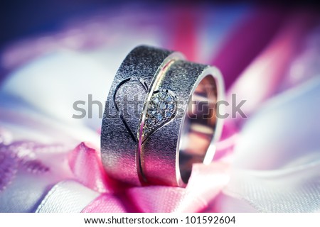 wedding rings on a cushion