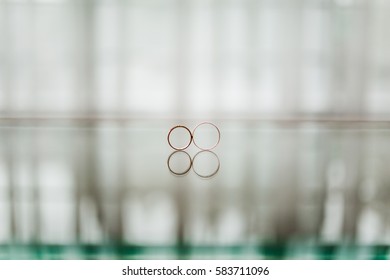 wedding rings with reflection