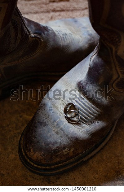 Wedding Rings Sitting On Cowboy Boot Stock Photo Edit Now 1450001210