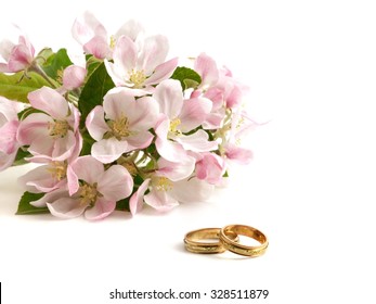 Wedding rings and spring flower. Holiday card with copy space.