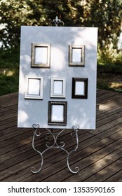 Wedding Seating Chart On Wooden Boards, Outdoors