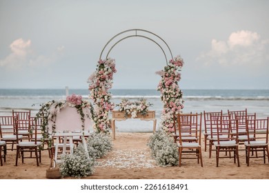 Wedding set up on beach. Beautiful tropical outdoor ceremony or party with ocean view. Luxury destination weddings concept - Powered by Shutterstock