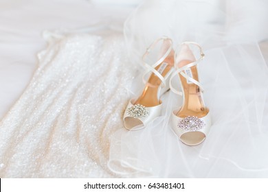 wedding shoes and wedding dress. 