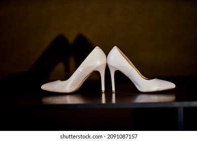 Wedding Shoes Light Reflection On The Table Dark Background Glitter Heels Gold Heels