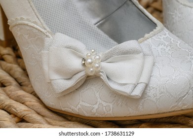 Wedding Shoes On A Wicker Basket