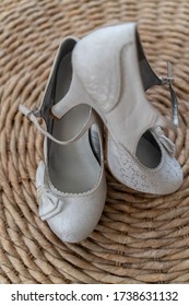 Wedding Shoes On A Wicker Basket