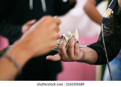 A Wedding Singer Receives 