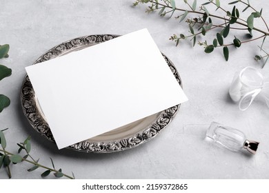 Wedding Stationery Invitation Card Mockup 7x5 On Silver Retro Vintage Plate On Grey Background With Eucalyptus, Menu Card Mockup With Festive Wedding Or Birthday Table Setting With Blank Card Mockup