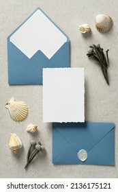 Wedding Stationery Set In Marine Style. Flat Lay Blue Envelopes And Wedding Invitation Card Mockup