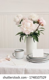 Wedding Still Life Scene. Business, Place Card Mockup Scene, Marble Tray, Cup Of Coffee An Pink Peony Flowers In Vase. White Linen Table Cloth. Floral Festive Feminine Styled Photo, Vertical.