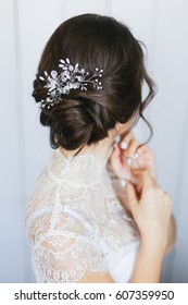 Wedding Stylish Hairstyle With Accessories. Elegant Brunette Bride Back With Collected Up Do Hair. 