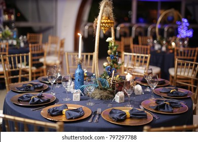 Wedding Table With Dark Blue Tablecloth, Cutlery, Glasses And Napkin 