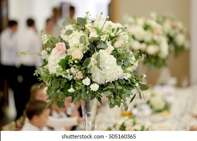 Wedding Table Decorations. Flowers On Vase On Wedding Table