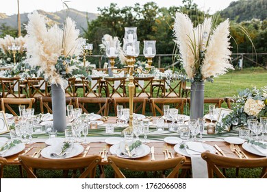 Wedding Table Set Up In Boho Style With Pampas Grass And Greenery, Soft Focus