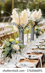 Wedding Table Set Up In Boho Style With Pampas Grass And Greenery, Soft Focus