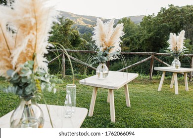 Wedding Table Set Up In Boho Style With Pampas Grass And Greenery, Soft Focus