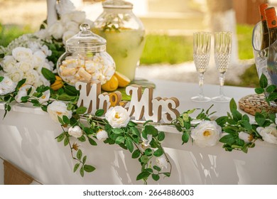 wedding table setting with lemonade marshmallows and champagne glasses 
