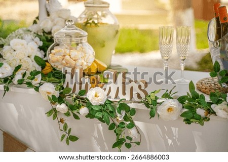 wedding table setting with lemonade marshmallows and champagne glasses 