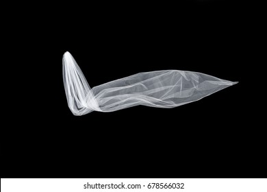 Wedding White Bridal Veil Isolated On The Black Background. Veil Flutters In The Wind