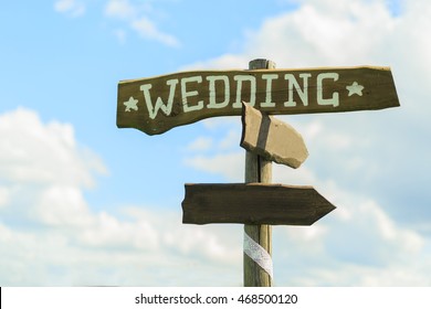 Wedding wooden sign on sky background - Shutterstock ID 468500120