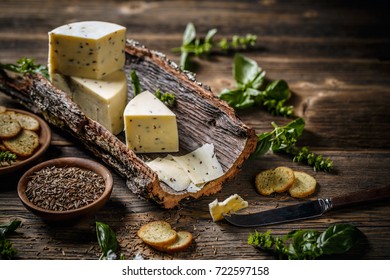 Wedge Of Cheese With Caraway Seeds