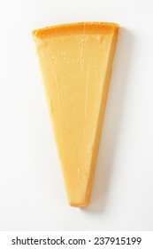 Wedge Of Parmesan Cheese On White Background