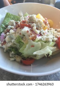 Wedge Salad Topped With Crumbled Blue Cheese