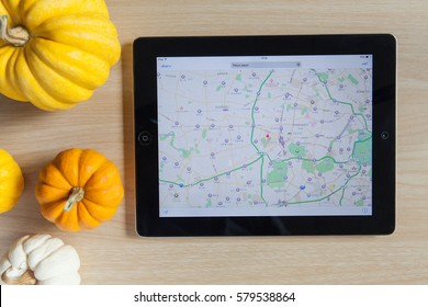 Wednesday 15 February 2017 : In Chiang Mai Thailand, Map App Running On  Ipad On Wooden Table On Top.