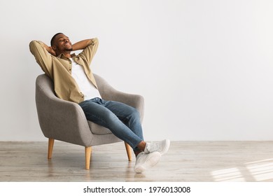 11,069 African man sitting on chair Images, Stock Photos & Vectors ...