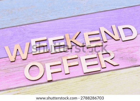 weekend offer write on rustical wooden background 