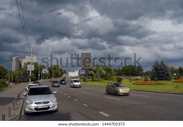 Weekend traffic. A\
small number of cars on the streets of Kiev at the weekend. July 7,\
2019. Kiev,Ukraine