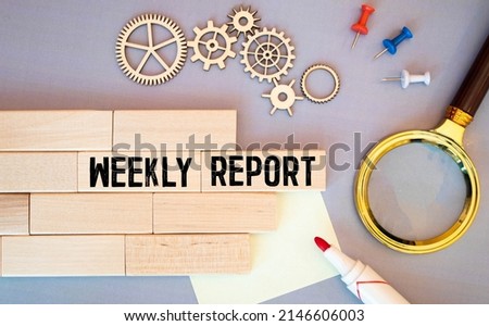 weekly report - text written in notebook on financial charts