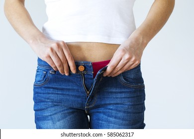 Weight Gain Woman Getting Dressed Wearing Jeans