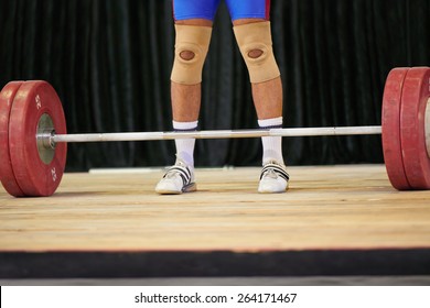 A weight lifter's feet before starting his lift