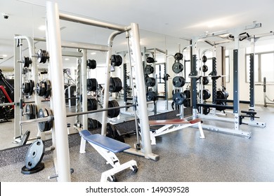 Weight Lifting Equipments In A Club Gym.